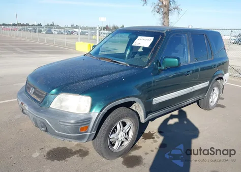 1999 Honda Cr-V Ex z USA, uszkodzony, nr VIN JHLRD1864XC045996